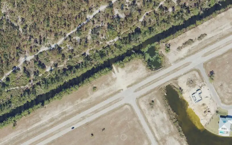 Aerial photo of the area around City of Cape Coral - Primitive Boat Ramp - 939 Wilmington Parkway, Lee County