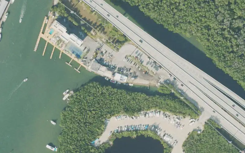 Aerial photo of the area around PonTunes Key Largo Boat Rentals, Marina and Tiki Bar (Small Boats - Parking Off-Site), Monroe County