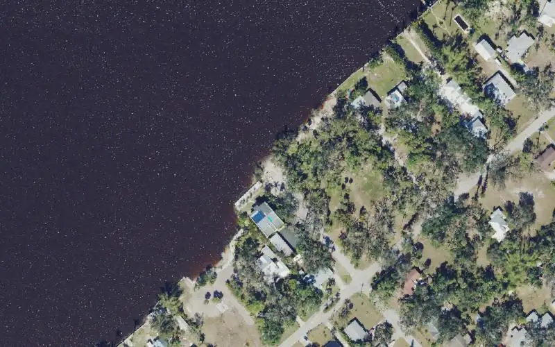 Aerial photo of the area around Tarpon Street Fishing Pier and Kayak Launch, Lee County